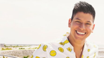 A young man smiling