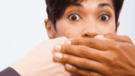Hands over mouth