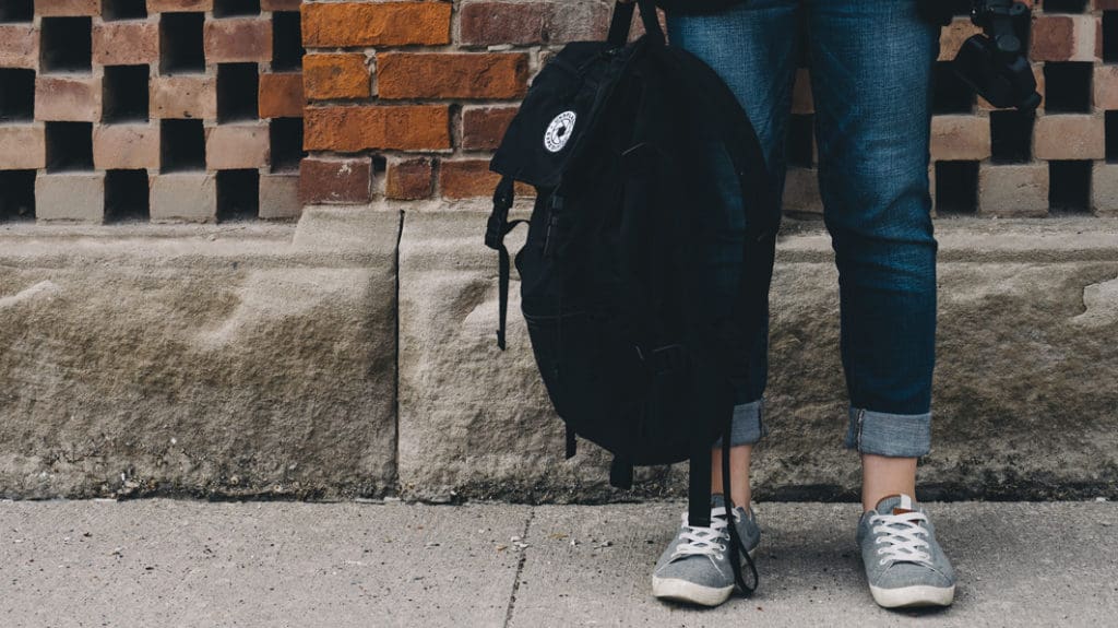 student with a backpack