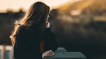 Woman on a bridge