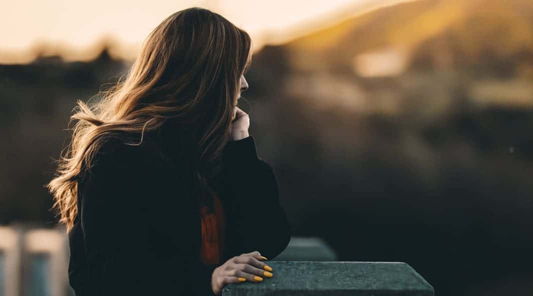 Woman on a bridge