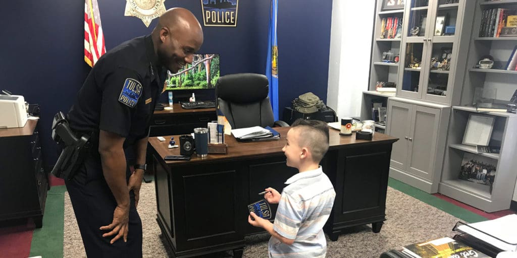 Trey prays for Tulsa police