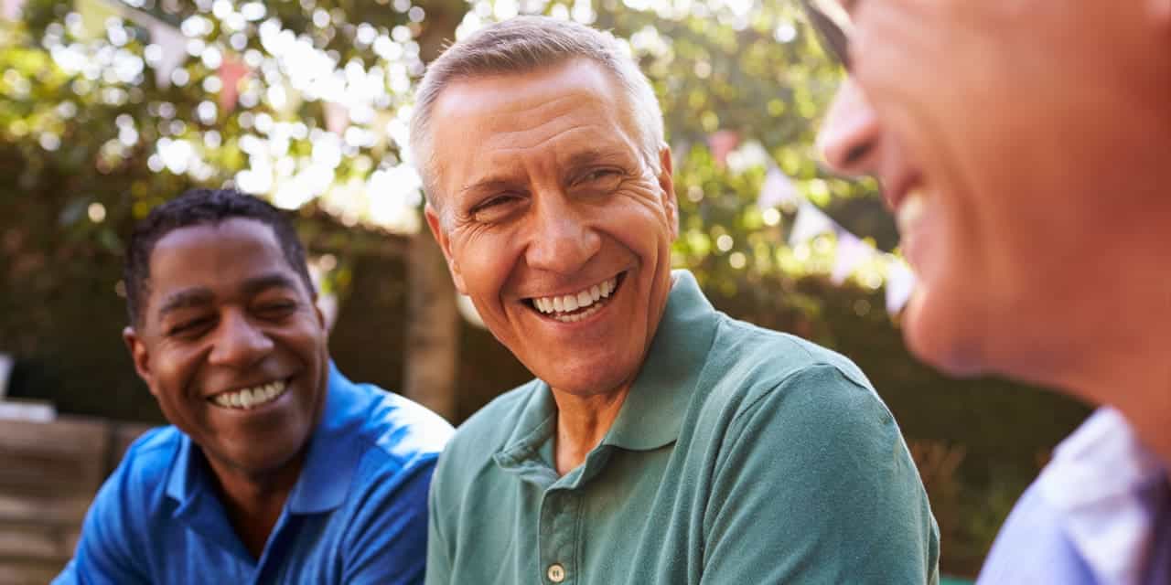 Three men talking