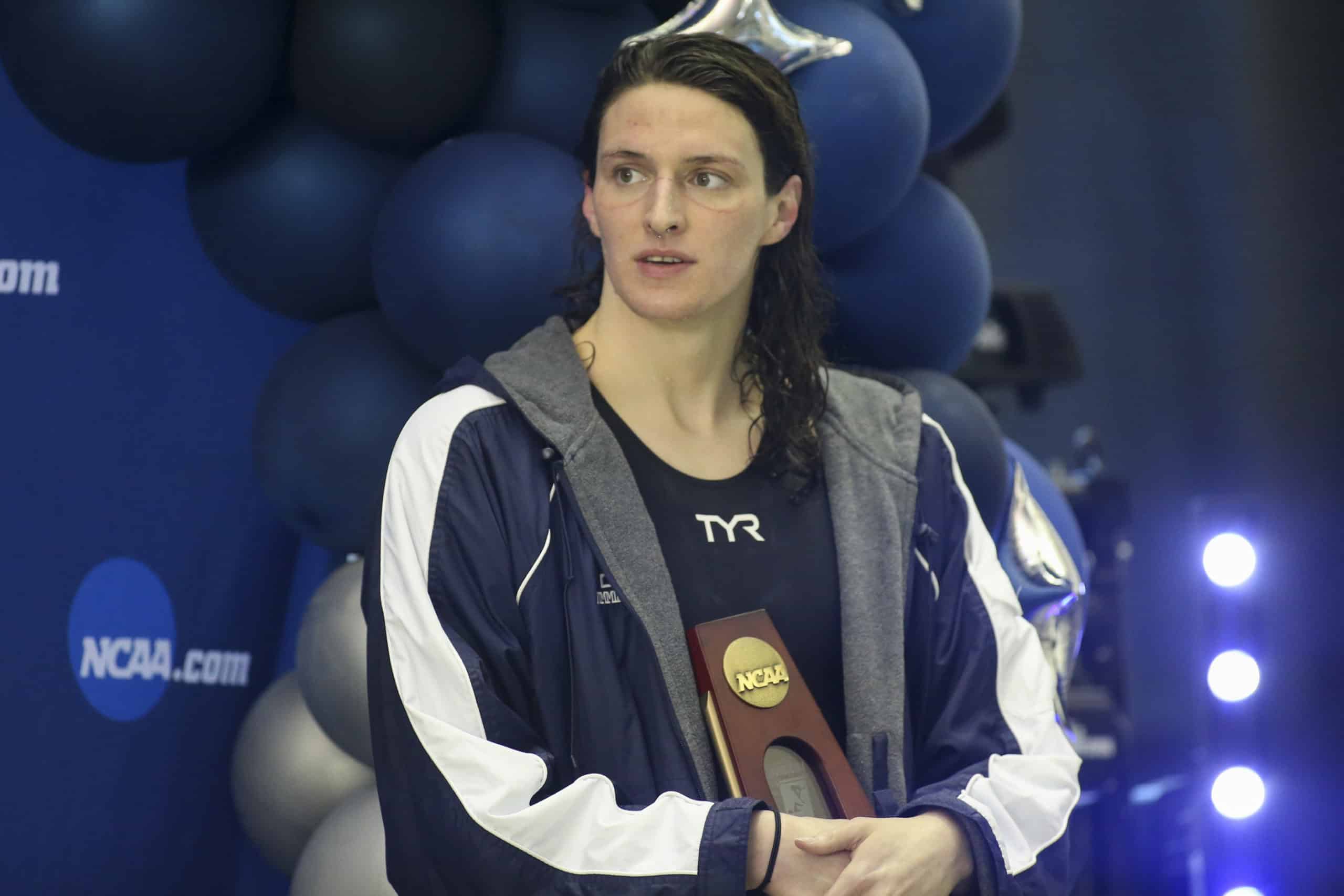 Lia Thomas Holding Trophy