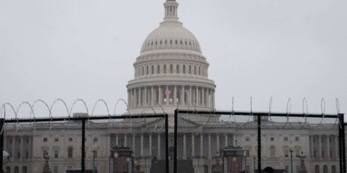 U.S. Capitol surrounded by barbed wire fences