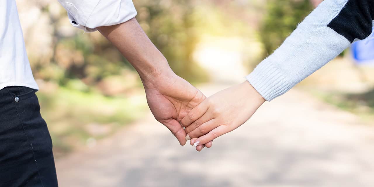 Holding hands||