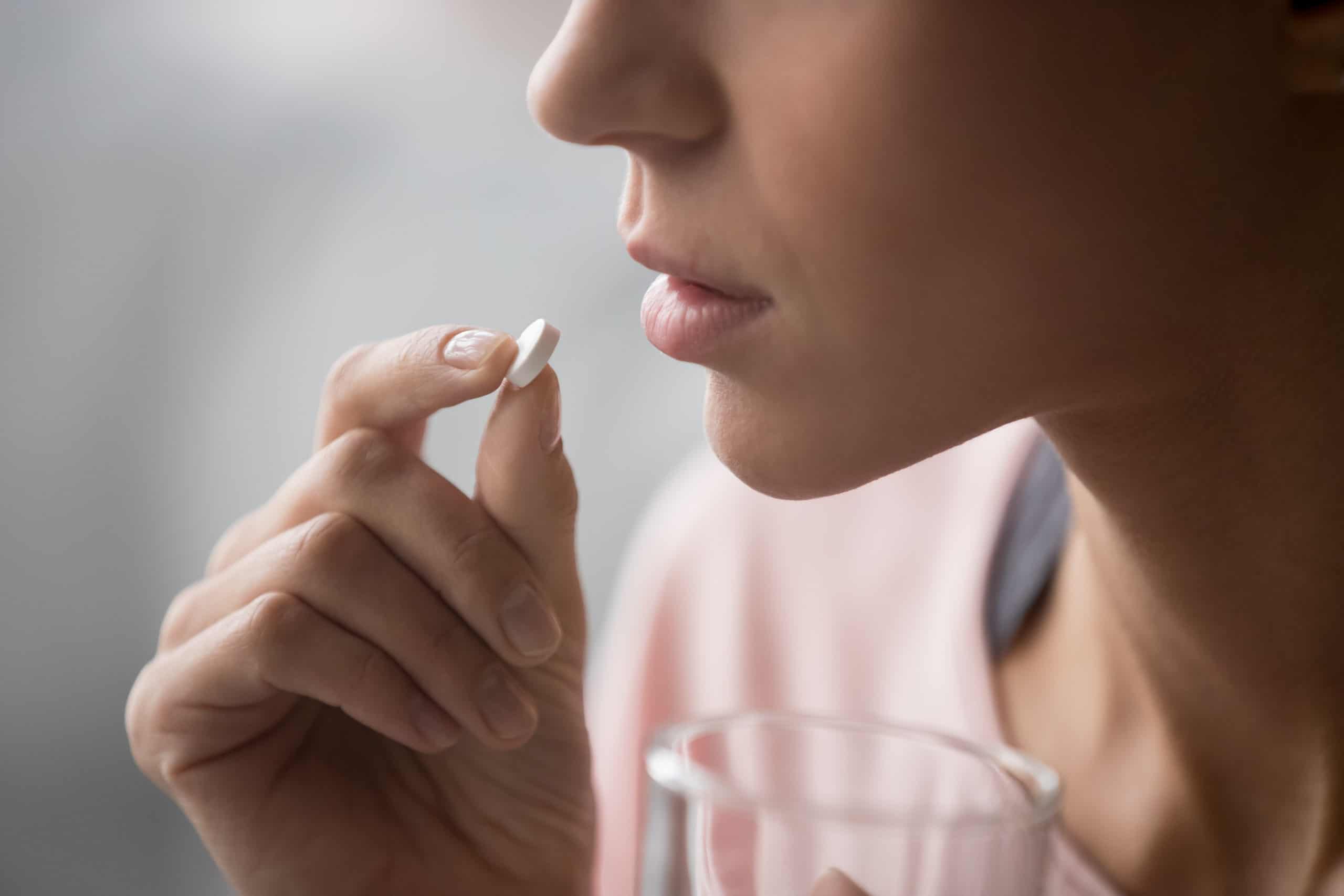 Woman Taking Pill
