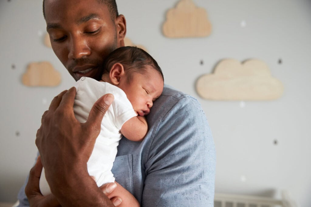 Father holding baby